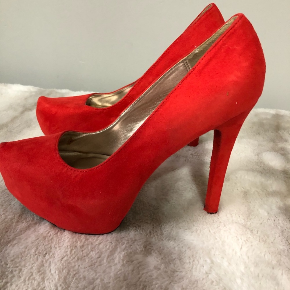 Bright red suede platform heels